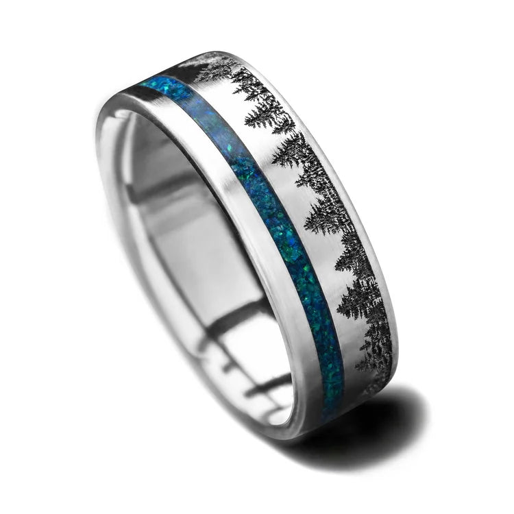 Mens 7mm titanium wedding band with black emerald opal inlay, free engraving, unique design on a white background.
