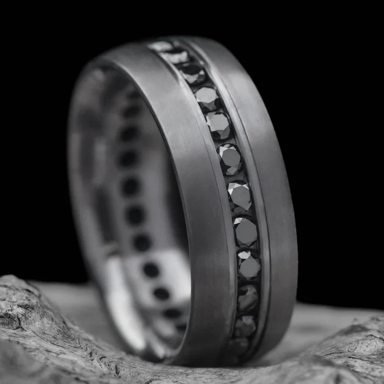 Tantalum wedding band with eternity set precious stones, brushed domed profile, 7mm mens ring on white sea branch, free engraving available.
