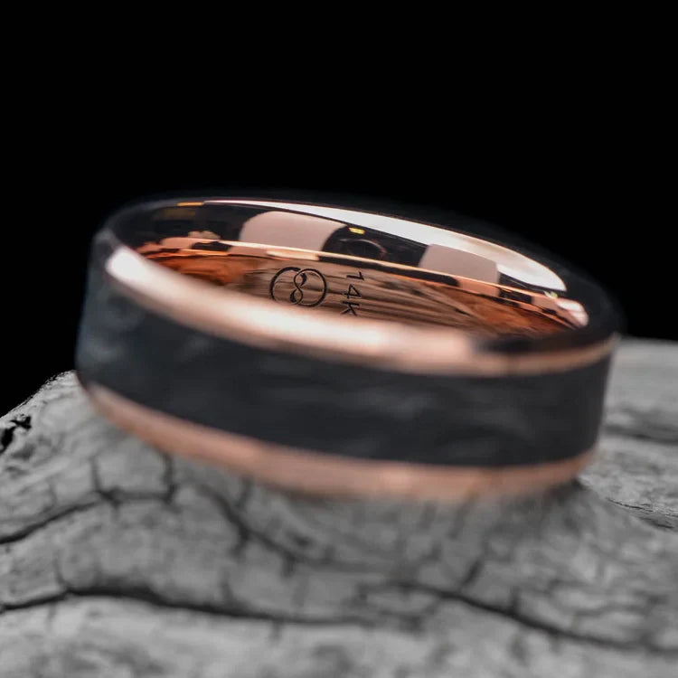 14K Rose Gold Mens Wedding Band with Central Forged Inlay, 7mm, Unique Brushed Bevel Profile, Free Engraving, displayed on a white sea branch.