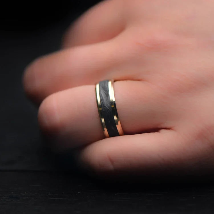 14KY gold wedding band with central forged inlay on a hand, featuring a 7mm mens ring with polished bevel profile, offering free engraving and custom design options.