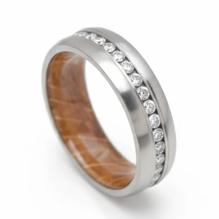 Brushed titanium wedding band with whiskey barrel oak inner sleeve, featuring eternity set stones, 7mm mens ring, free engraving option, displayed on a white background.