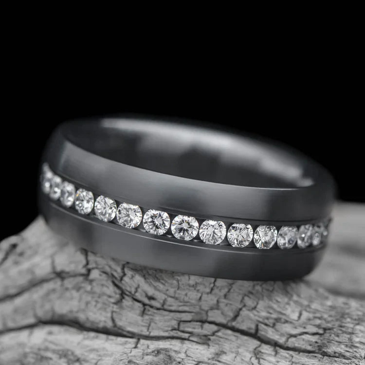 Zirconium wedding band with eternity set precious stones, mens 6mm brushed domed profile ring, displayed on a white sea branch, free engraving available.