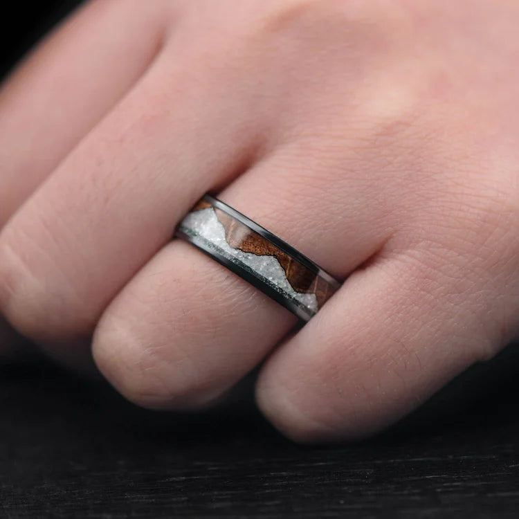 Mens black titanium wedding band with moss agate, whiskey barrel oak, and pearl inlays, 7mm, unique design, free engraving, worn on hand, elegant mens wedding ring.