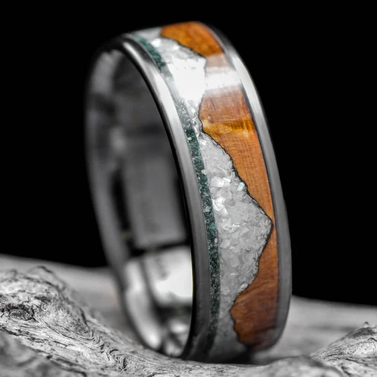 Black Titanium Wedding Band with Moss Agate, Whiskey Barrel Oak, and Pearl Inlays, 7mm Mens Ring on White Sea Branch, Unique Mens Wedding Band with Free Engraving.