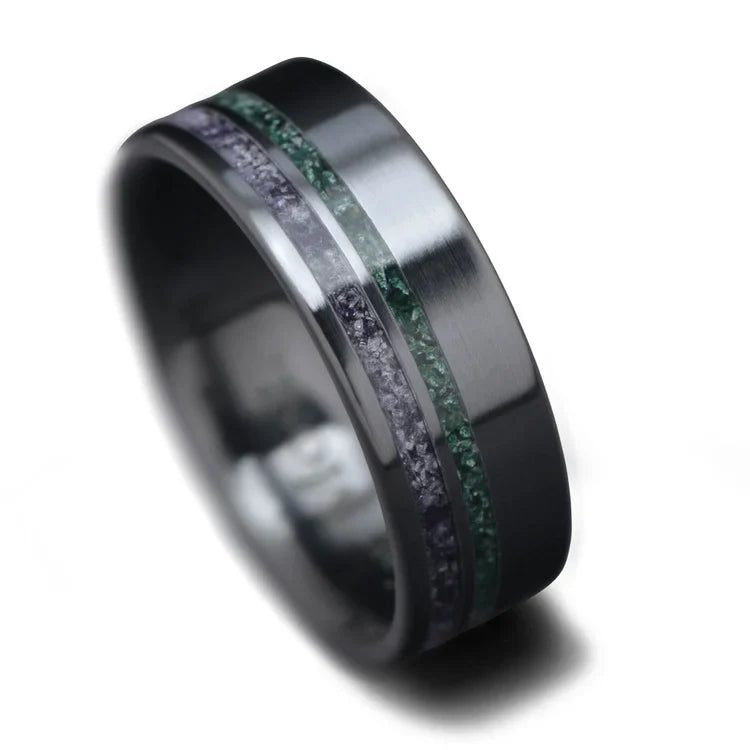 Black titanium wedding band with amethyst and moss agate inlays, 7mm mens ring, unique design, free engraving available, displayed on a white background.