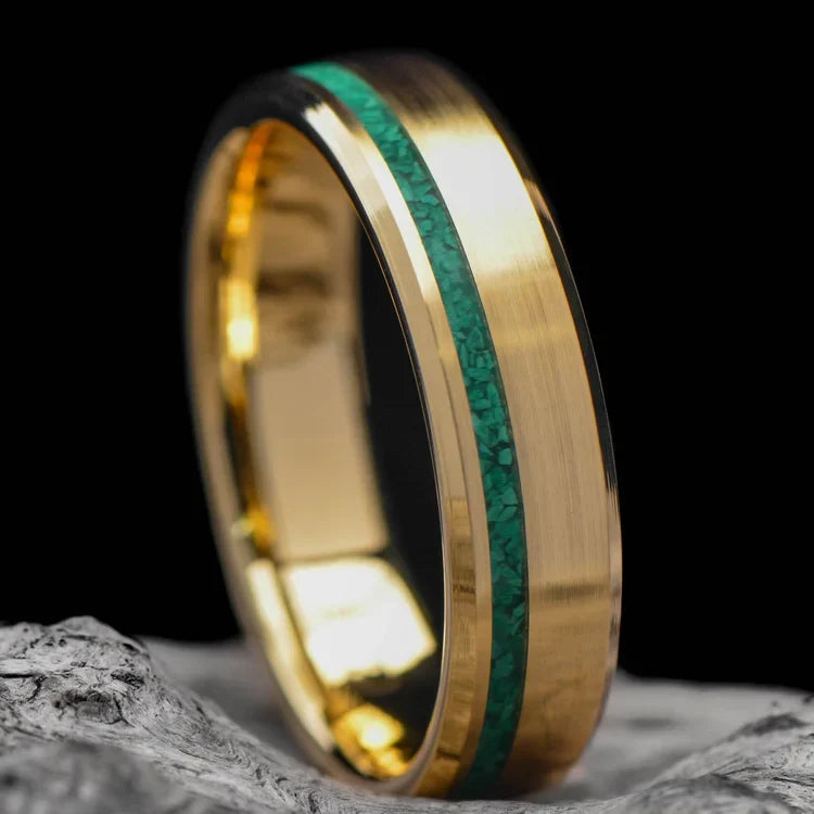 18K yellow gold wedding band with malachite inlay, featuring a polished bevel profile, 6mm mens ring, unique design, free engraving, displayed on a white sea branch.