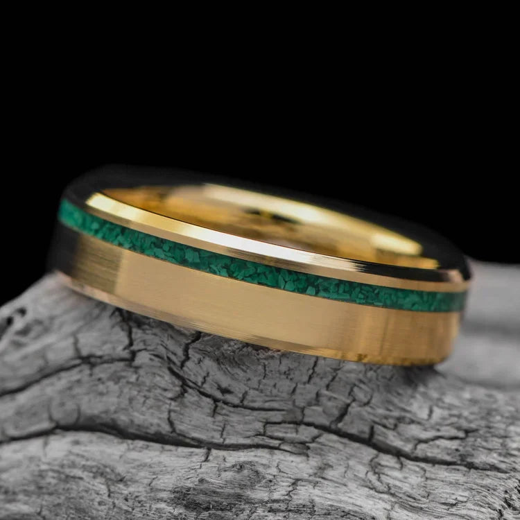 18K yellow gold wedding band with malachite inlay, 6mm mens ring, polished bevel profile, unique design, free engraving, displayed on white sea branch.