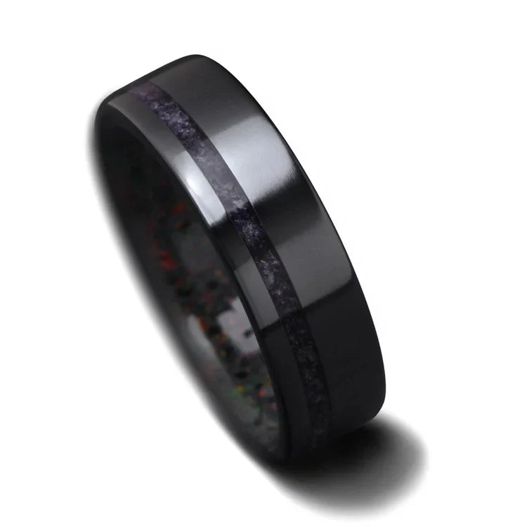 Black titanium wedding band with amethyst and black fire opal inlay, 6mm mens ring, polished flat profile, free engraving available, displayed on a white background.
