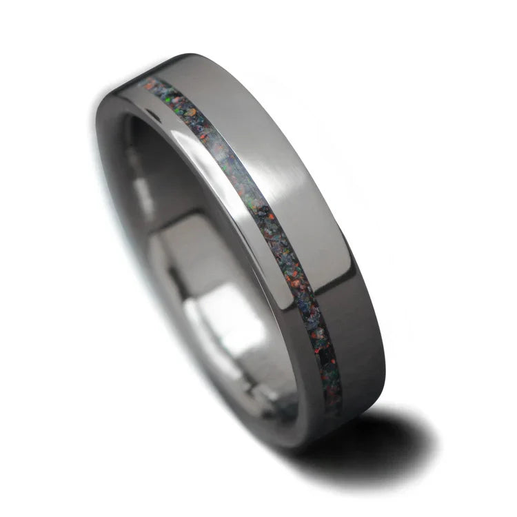 Titanium wedding band with black fire opal inlay, polished flat profile, 5mm, custom simple ring, free engraving, elegant design on white background.