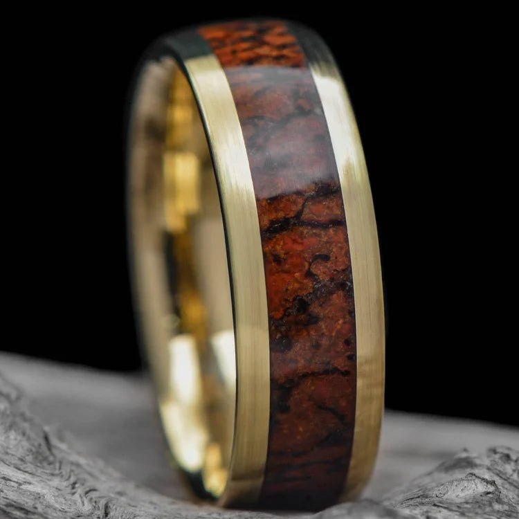 10KY gold mens wedding band with solid T-Rex central inlay, 7mm wide, shown on a hand; unique custom ring with free engraving option.