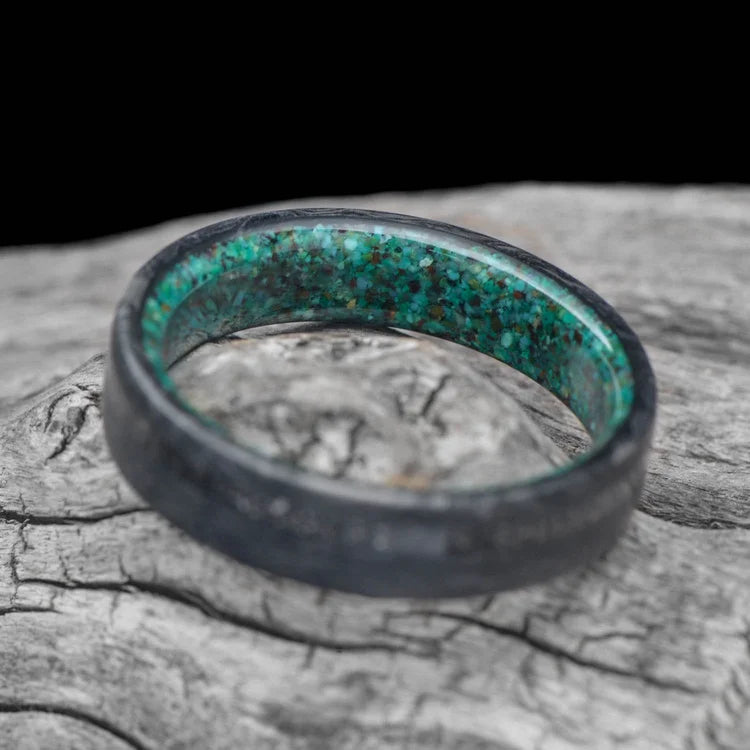 Mens 6mm forged wedding band with meteorite and turquoise inlay, unique brushed flat profile, free engraving, displayed on a white background.