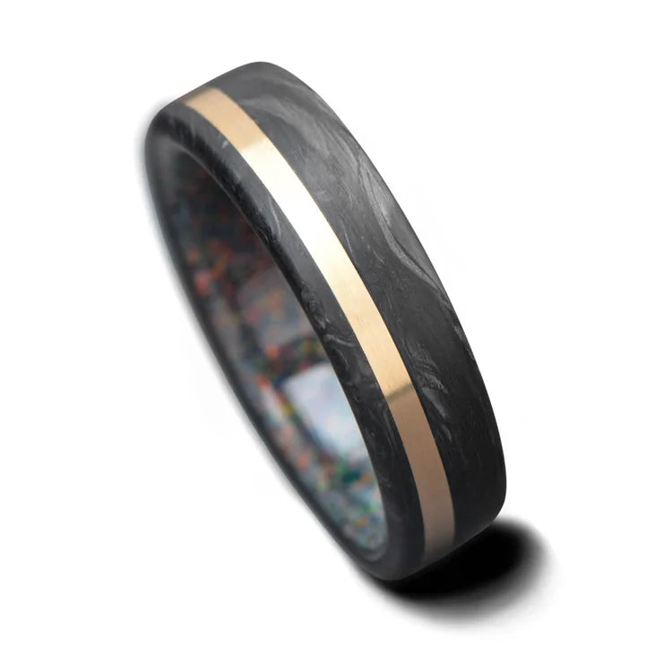 Mens 6mm forged wedding band with 14K yellow gold and black fire opal inlay, featuring a brushed flat profile, available with free engraving, displayed on a white background.