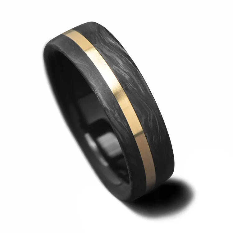Mens 7mm forged wedding band with 10KY gold inlay and African blackwood inner sleeve, brushed flat profile, free engraving, displayed on white background.