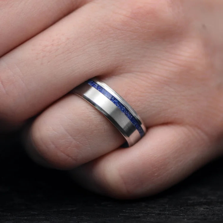 Mens titanium wedding band with lapis lazuli inlay and whiskey barrel oak sleeve, 7mm, unique design, free engraving, worn on hand.