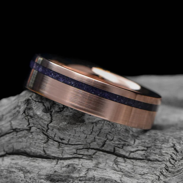 14K rose gold mens wedding band with amethyst inlay, 6mm width, custom engraving available, displayed on a white sea branch.