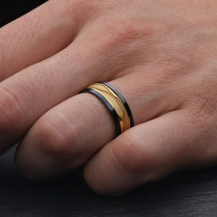 ALT text: "Black Titanium Ring with 18KY Wave Central Inlay on hand | FREE ENGRAVING | 8mm Men's Wedding Band | Polished Domed Profile | Custom Men's Ring"