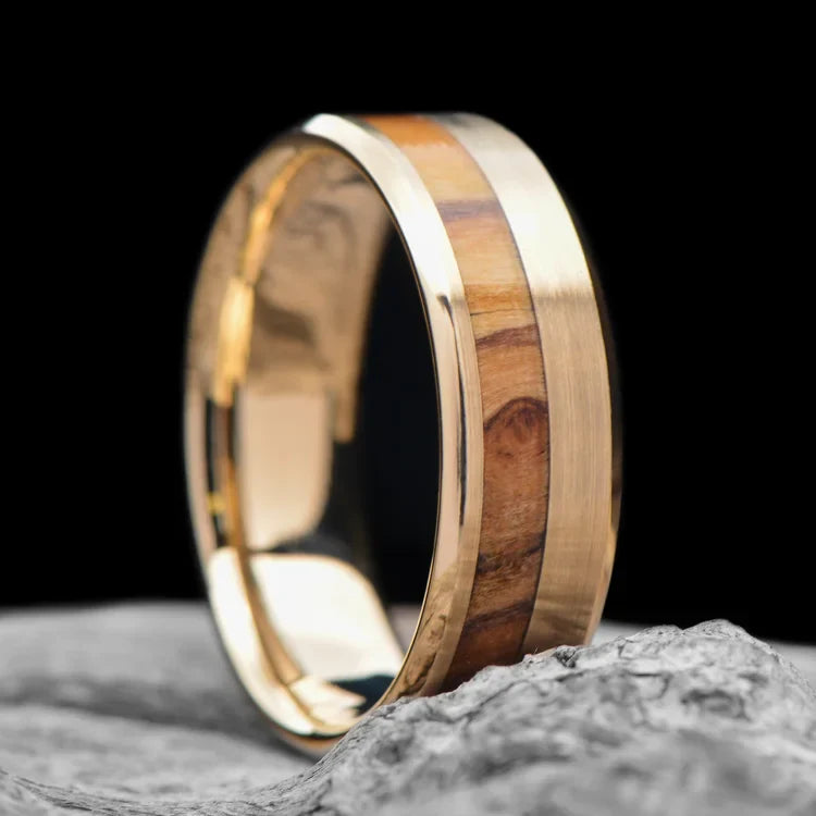 14K Yellow Gold Wedding Band with Olivewood Inlay for Men, 7mm, Brushed Beveled Profile, Unique Design, Free Engraving, Men's Wedding Ring on White Sand Beach Background