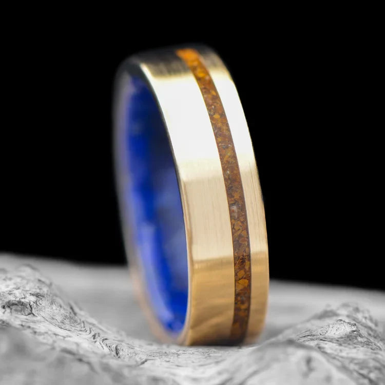 10KY gold wedding band with tiger's eye and lapis lazuli inlay, free engraving, 6mm men's ring, unique custom design, displayed on a white sea branch.