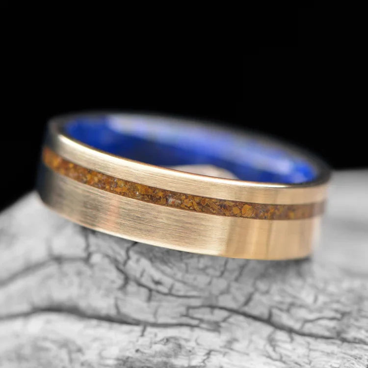 10KY gold wedding band with tiger's eye and lapis lazuli inlay, 6mm men's ring, unique custom design, free engraving, displayed on white sea branch