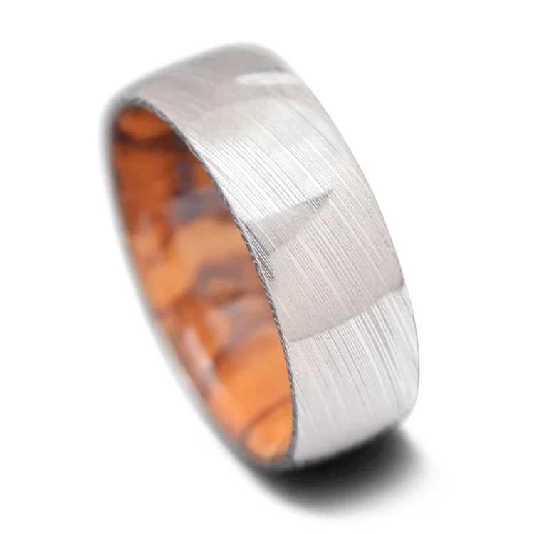 Heimskringla Wedding Band with Olivewood Inner Sleeve, 8mm Men's Ring, Polished Domed Profile, Unique Design, Free Engraving, Displayed on White Background