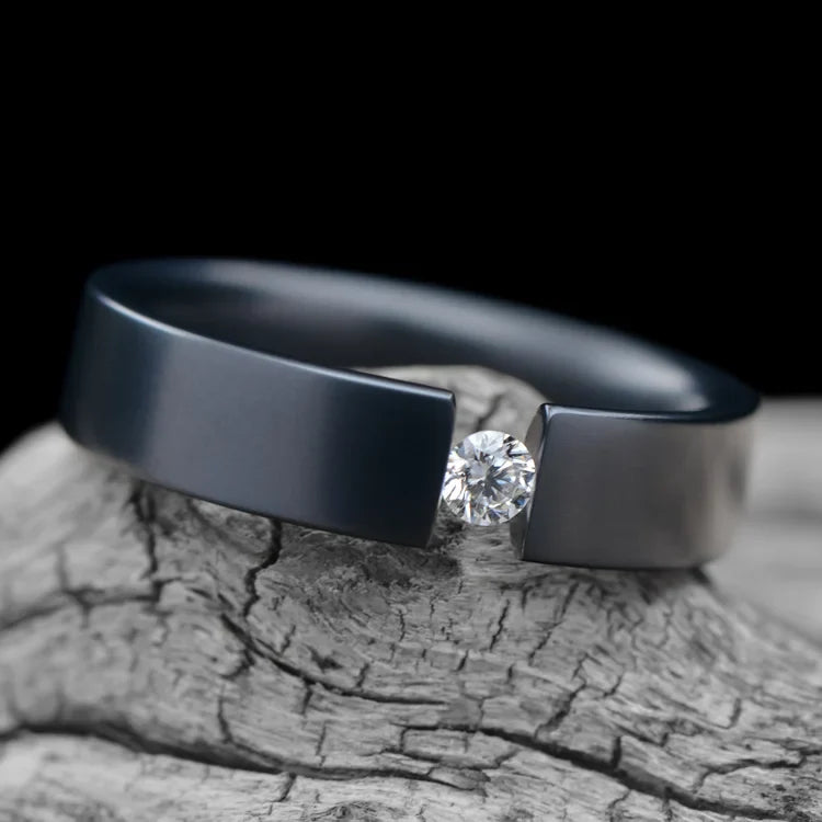 Black titanium wedding band with tension set diamond on white sea branch, 5mm custom unique wedding ring with free engraving, elegant mens or womens wedding jewelry.