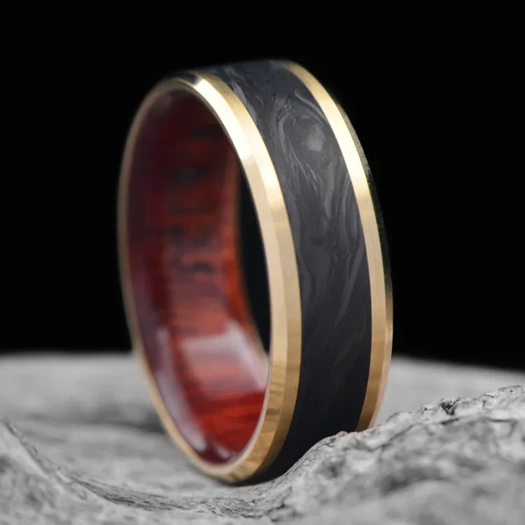 10KY Gold Wedding Band with Central Forged Inlay and Bloodwood Inner Sleeve, 7mm Mens Ring, Brushed Beveled Profile, on White Sea Branch, Free Engraving Available