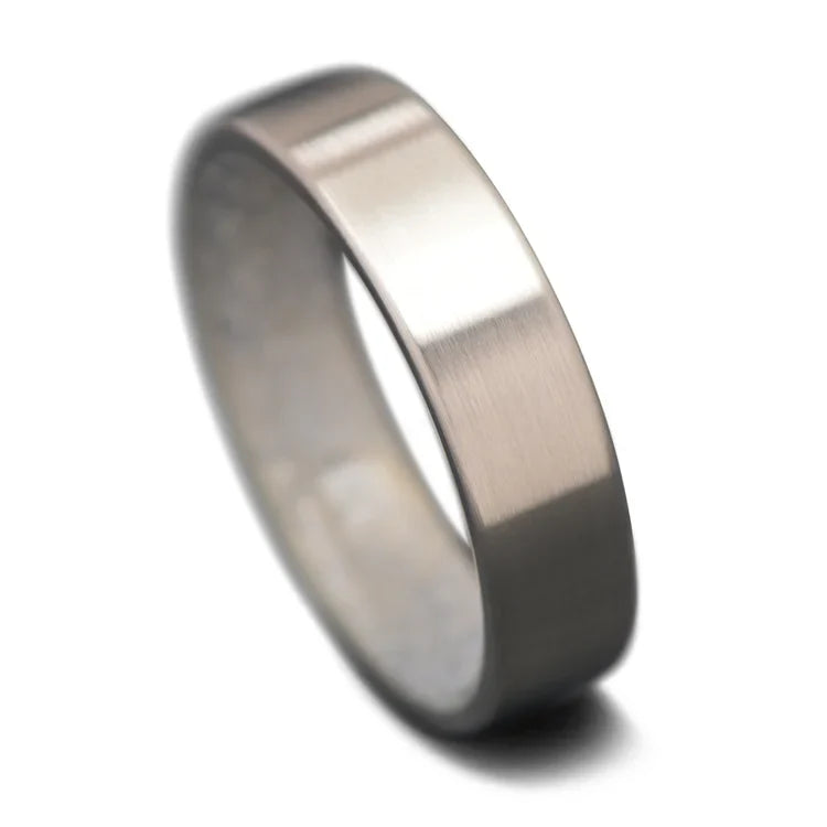 14KW mens wedding band with moonstone inner sleeve, brushed flat profile, 6mm width, custom ring with free engraving, displayed on a white background.