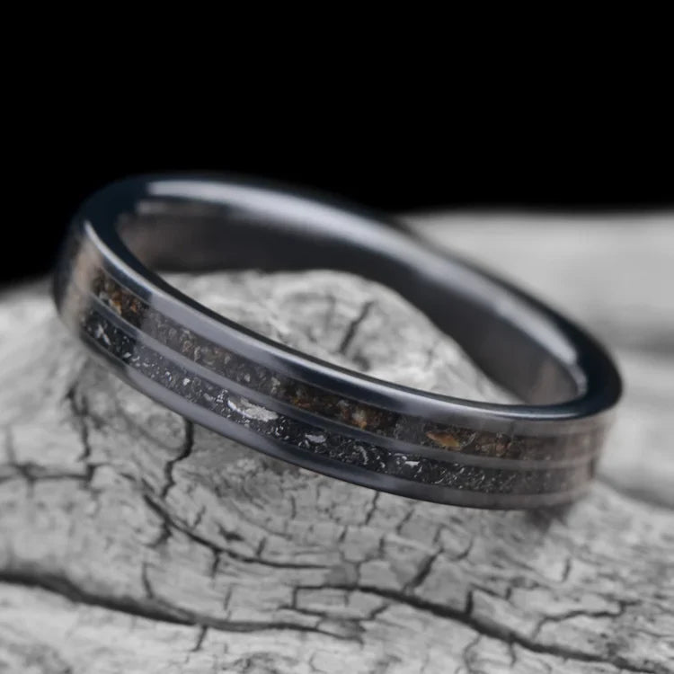 Black Titanium Wedding Band with Meteorite Inlay, 4mm, Custom Simple Ring, Unique Wedding Band, Free Engraving, displayed on white sea branch background.