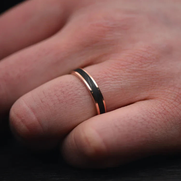 10K rose gold wedding band with forged central inlay on hand, featuring free engraving, 4mm width, custom and unique simple design.