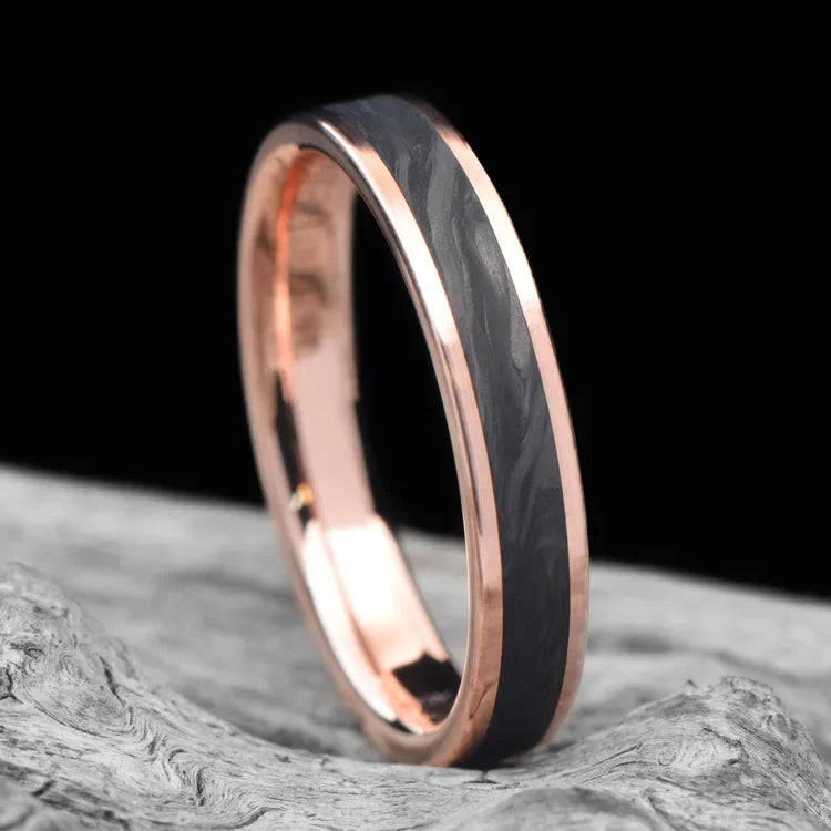 10KR wedding band with forged central inlay, 4mm unique simple custom wedding ring, free engraving, displayed on a white sea branch.