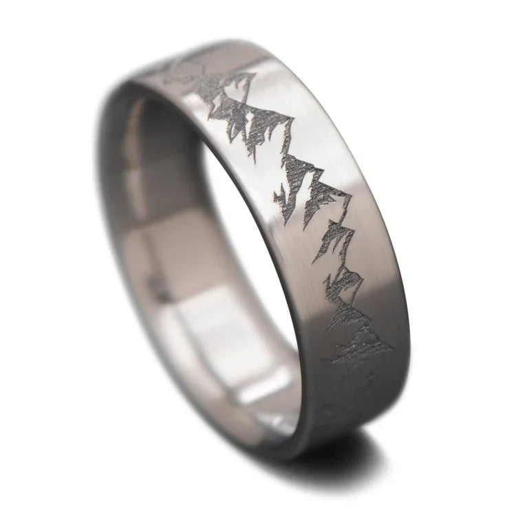 Titanium wedding band with brushed finish, 7mm mens ring, custom engraving available, sleek and modern design on white background.