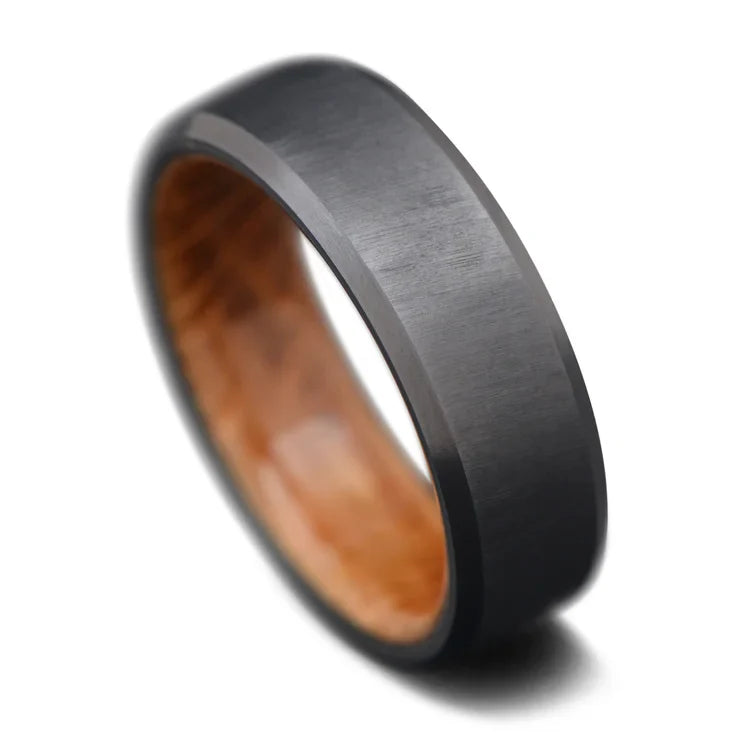 Black titanium wedding band with whiskey barrel oak inner sleeve, 7mm mens ring, unique design, free engraving, on a white background.