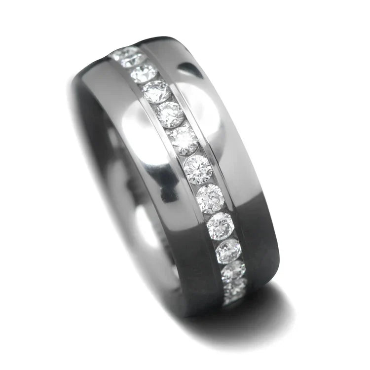 Titanium wedding band with eternity set precious stones, polished domed profile, 8mm mens ring, free engraving, on a white background.