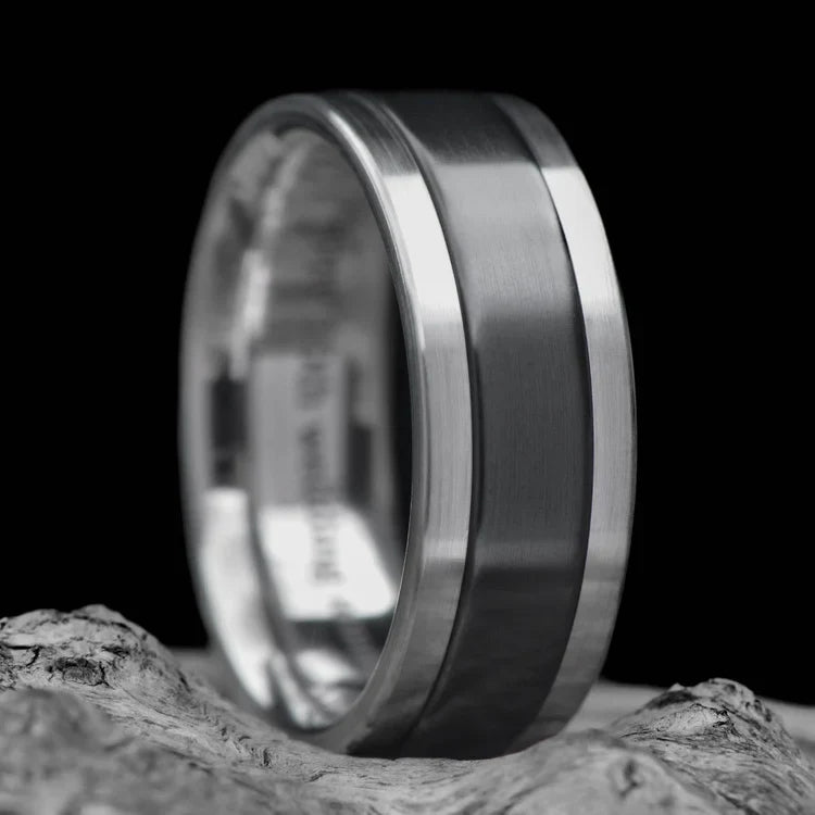 Aluminum wedding band with central zirconium inlay, 9mm mens ring featuring a polished step profile, unique design, free engraving available, displayed on a white sea branch background.
