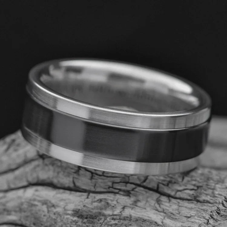 Aluminum wedding band with central zirconium inlay, 9mm mens ring, polished step profile, unique design, free engraving, displayed on white sea branch.