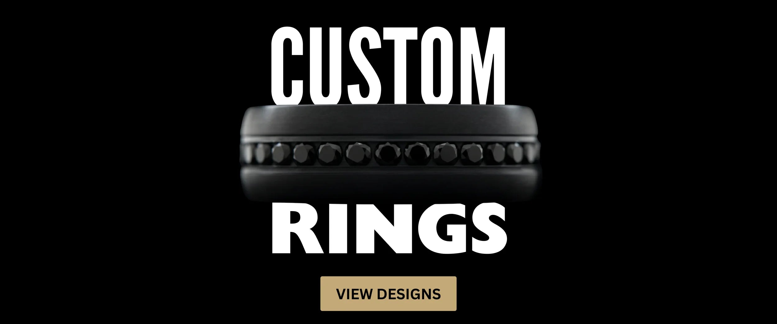 Black custom wedding ring with gemstone inlay shown on a dark background.