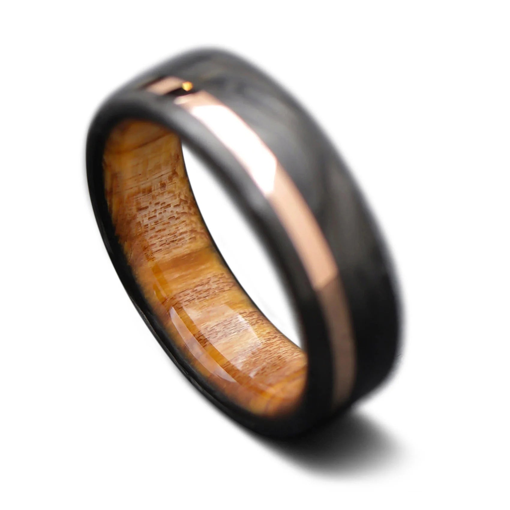 Back of carbon fiber wedding ring with rose gold inlay and Silver Spalted Birch inner sleeve, 6mm -THE HORIZON
