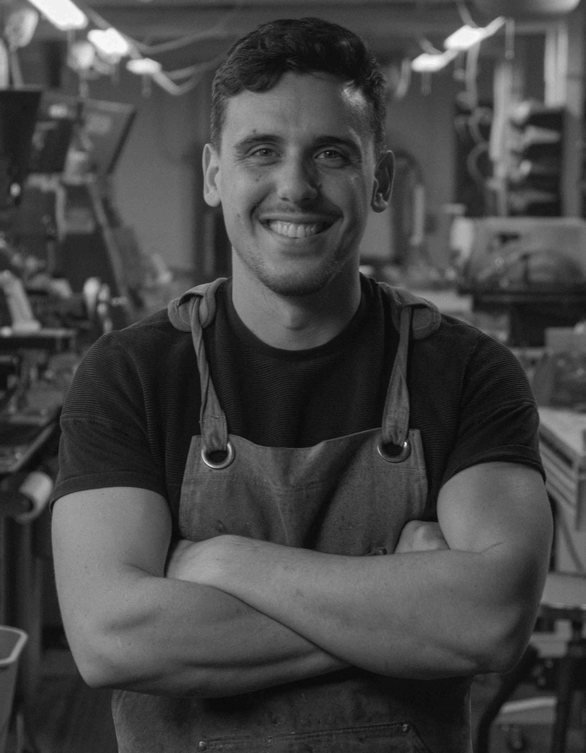 Lorenzo Guerrini, founder of Sesto Synergy, in the Rochester, New York workshop where the custom wedding rings are made.