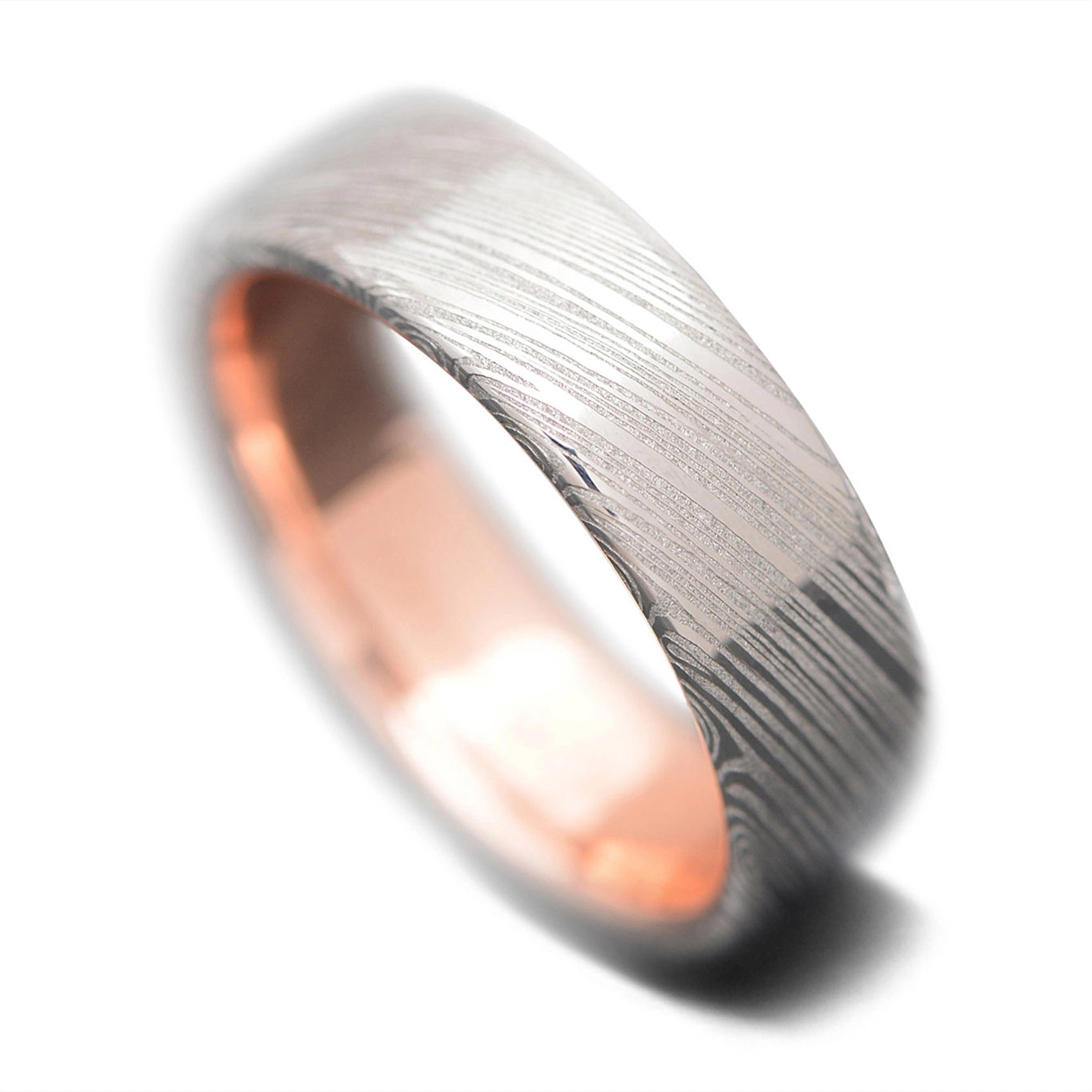 Unique Damascus Men's Wedding Band with Rose Gold Inner Sleeve | 7mm