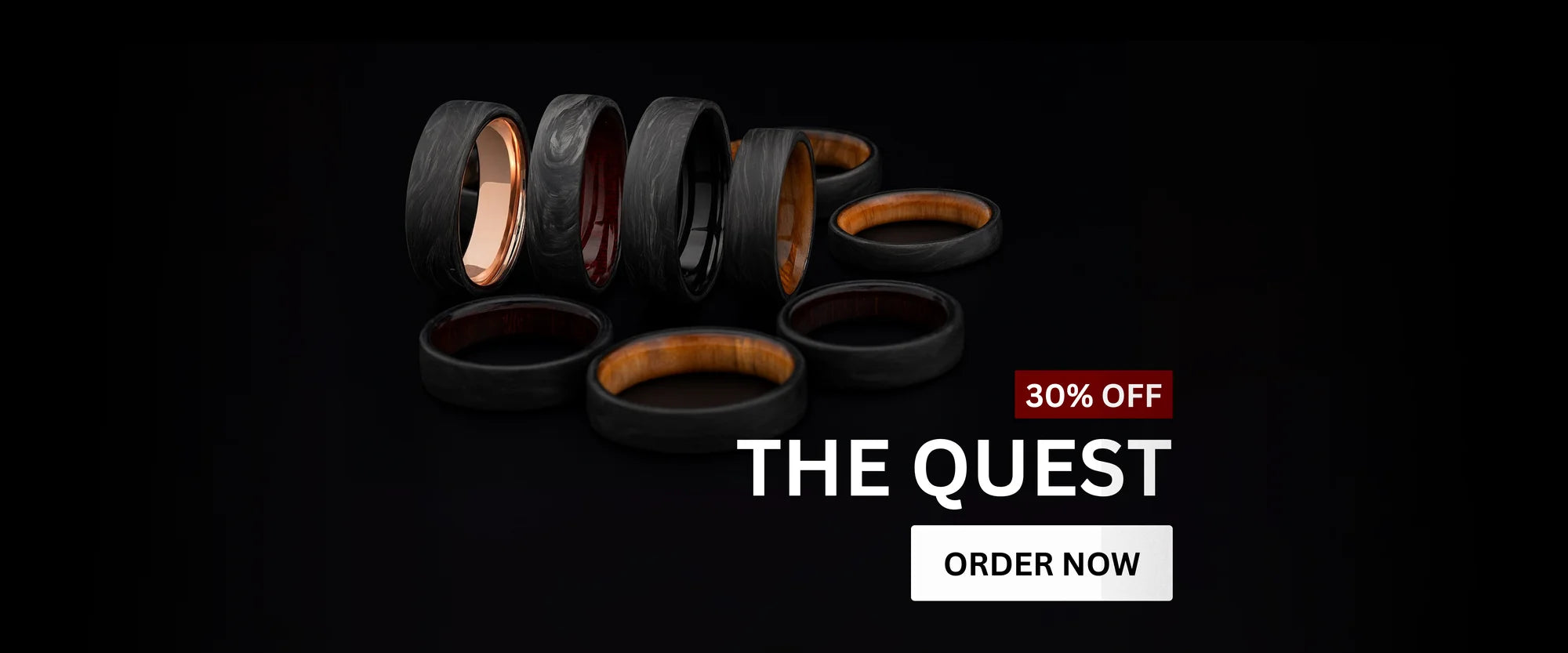 Forged carbon wedding rings from The Quest collection displayed on a black background. Several variations with wood, copper, and colored interiors are shown. Text overlay reads ‘30% Off – The Quest’ with an ‘Order Now’ button