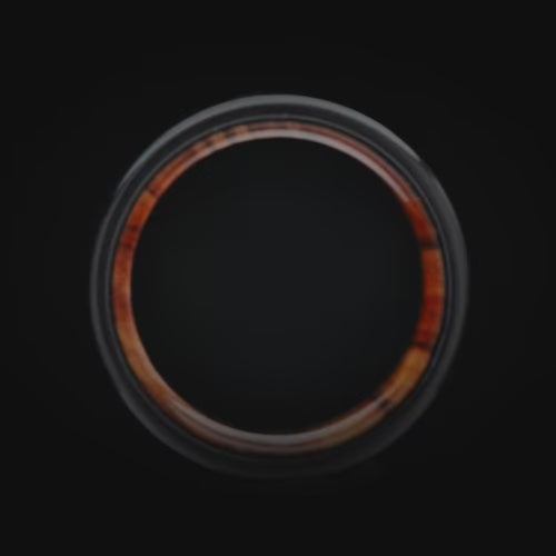 Black titanium wedding band featuring a moss agate and olivewood inlay, 7mm width, mens unique wedding ring with free engraving option.