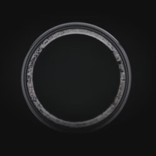 Black titanium wedding band featuring moss agate and guitar string inlays, 7mm mens ring with deer antler inner sleeve, free engraving available.